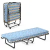 A folded and an unfolded portable bed with a blue patterned mattress, shown against a white background. Anteprima dell’immagine prodotto