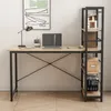 A modern computer desk with shelves attached to the side, set against a white wall and wooden floor. Produktbild-Vorschau