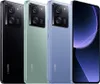 Three smartphones in different colors are displayed side-by-side, with a fourth smartphone screen visible on the right. Podgląd zdjęcia produktu