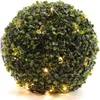 A spherical artificial plant with embedded warm white LED lights. Produktbild-Vorschau