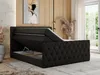 A black upholstered boxspring bed with its storage compartment open, in a modern bedroom setting. Produktbild-Vorschau