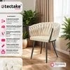 A cream-colored upholstered chair with a distinctive braided design, placed in a room setting with plants and curtains. The image includes a text-based information overlay about the product's features. Náhled obrázku produktu