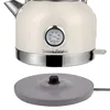 A cream-colored electric kettle with a built-in thermometer and its power base are shown against a white background. Voir les images du produit