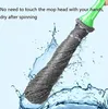 A mop head with water splashing around it. Voir les images du produit