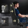 A man sitting in a gaming chair, with diagrams highlighting the chair's ergonomic features. Anteprima dell’immagine prodotto