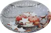 A festive arrangement of apples, star-shaped cookies, and nuts dusted with powdered sugar, presented on a decorative plate. Produktbild-Vorschau