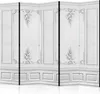 A white room divider with ornate wall paneling. Produktbild-Vorschau