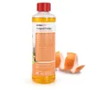 A bottle of orange oil cleaner with orange peels next to it. Produktbild-Vorschau