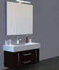 A bathroom vanity with a sink, faucet, mirror cabinet, and accessories against a gray wall. Voir les images du produit