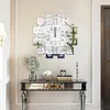 A decorative wall clock is displayed above a console table in a well-lit room. Anteprima dell’immagine prodotto
