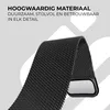A close-up of a black Milanese watch strap with text overlay describing its features. Produktbild-Vorschau