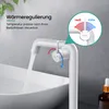 A white faucet with water flowing into a white sink, with a diagram showing temperature control. Podgląd zdjęcia produktu