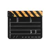 A black film clapperboard with yellow and orange stripes on the top. Náhled obrázku produktu