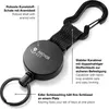 A black retractable keychain with descriptive text labels pointing to its features. Produktbild-Vorschau