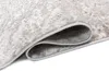 A close-up view of a rolled-up rug, showing the texture and edge binding. Anteprima dell’immagine prodotto