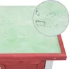 A close-up view of the roof of a red and green wooden rabbit hutch, with water droplets visible on the green surface. Náhled obrázku produktu