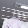 A ceiling-mounted electric clothes dryer with laundry hanging on it. Náhľad obrázku produktu
