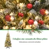 A decorated Christmas tree with lights and ornaments, and a separate image of a Christmas tree with a stand. Náhľad obrázku produktu