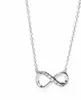 A silver infinity necklace with small clear stones on a white background. Náhled obrázku produktu