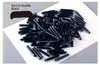 A pile of black ink cartridges on a white surface. Náhľad obrázku produktu