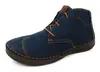 A single blue leather boot with brown laces and sole, set against a white background. Produktbild-Vorschau