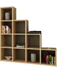 A tiered shelving unit with books, a media player, and decorative items. Produktbild-Vorschau