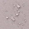 A close-up view of water droplets on a textured fabric surface. Anteprima dell’immagine prodotto