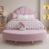 A pink bed with a matching bench and unicorn pillow in a bedroom. Produktbild-Vorschau
