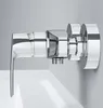 A close-up, studio shot of a chrome faucet mounted on a wall above a white sink. Produktbild-Vorschau
