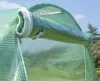 A close-up view of a green greenhouse with a rolled-up window or vent. Náhled obrázku produktu
