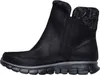 A side view of a black Skechers winter boot with a knitted cuff. Voir les images du produit