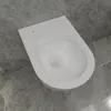 A white toilet bowl is shown from a high angle, placed on a gray marble-tiled floor. Produktbild-Vorschau