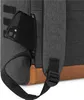 A close-up view of a dark gray backpack with a brown leather accent at the bottom. A smartphone is partially visible in a zippered pocket on the side of the backpack. Anteprima dell’immagine prodotto