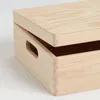 A close-up view of a wooden storage box with its lid slightly ajar. Anteprima dell’immagine prodotto