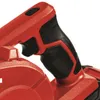 A close-up view of the handle and part of the body of a red and black power tool. Produktbild-Vorschau