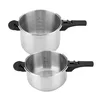 Two stainless steel pressure cookers are shown against a white background. The top cooker is larger than the bottom one. Both have black handles and measurement markings inside. Náhled obrázku produktu