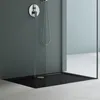 A modern shower tray with a shower head and faucet. Produktbild-Vorschau