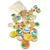 A collection of wooden game pieces and dice are scattered on a white surface, with a drawstring bag in the background. Anteprima dell’immagine prodotto