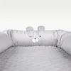 A close-up view of a grey baby nest with a teddy bear face design. Anteprima dell’immagine prodotto