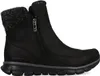 A black Skechers winter boot with a knitted cuff and a side zipper, shown against a white background. Voir les images du produit