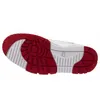 The image shows the sole of a white and red Nike Cross Trainer Low sneaker. Náhled obrázku produktu