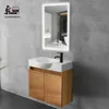 A modern bathroom vanity with a sink and mirror mounted on a concrete wall. Produktbild-Vorschau