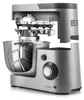 A close-up, studio shot of a silver kitchen mixer with its internal gears exposed. Podgląd zdjęcia produktu