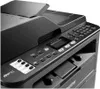 Close-up view of the control panel and top section of a black Brother MFC-L2710DW multifunction printer. Podgląd zdjęcia produktu