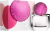 A product shot of a perfume bottle and its packaging. Produktbild-Vorschau