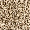 A close-up, overhead view of a pile of straw pellets. Produktbild-Vorschau