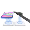 A blue smartphone and a black smartwatch are placed on a white dual wireless charging pad. Blue energy waves emanate from the charging pad towards the devices, indicating they are charging. Produktbild-Vorschau