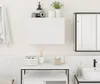 A clean, modern bathroom setting with a white wall and tiled backsplash. Anteprima dell’immagine prodotto