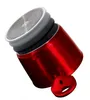 A close-up, angled view of a red pot with its lid and layers visible. Produktbild-Vorschau