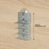A metal roller with adjustable height settings on a wooden surface. Náhled obrázku produktu